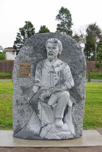 Statue of Henry Kendall, on an inclement day in Kendall, NSW