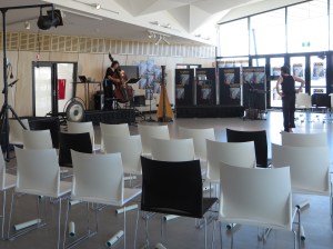 Pre Show, with scrolls under seats, and double bassist and a dancer doing a last minute practice
