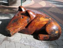 Wooden dog sculpture