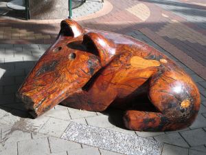 Wooden dog sculpture
